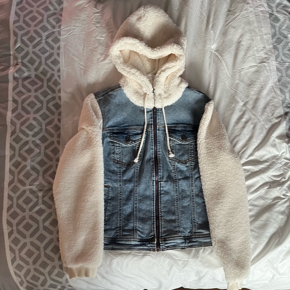 Jean jacket with white fuzzy sleeves and hood